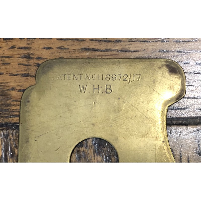 Post war brass button stick stamped Patent No 116972/17 W.H.B